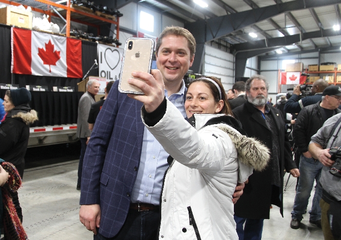 Conservative leader Andrew Scheer takes a selfie with Chelsea Hattum at an event in Moosomin earlier this year.